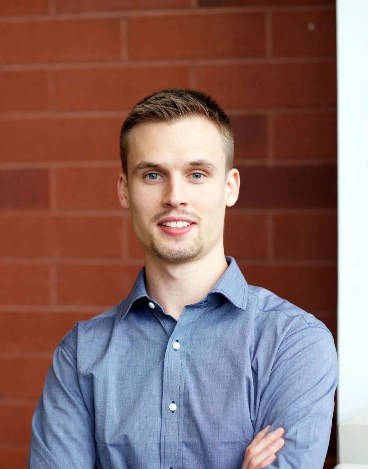 Portrait of Devon Thomas, co-founder and Creative Director of Neutrino Design