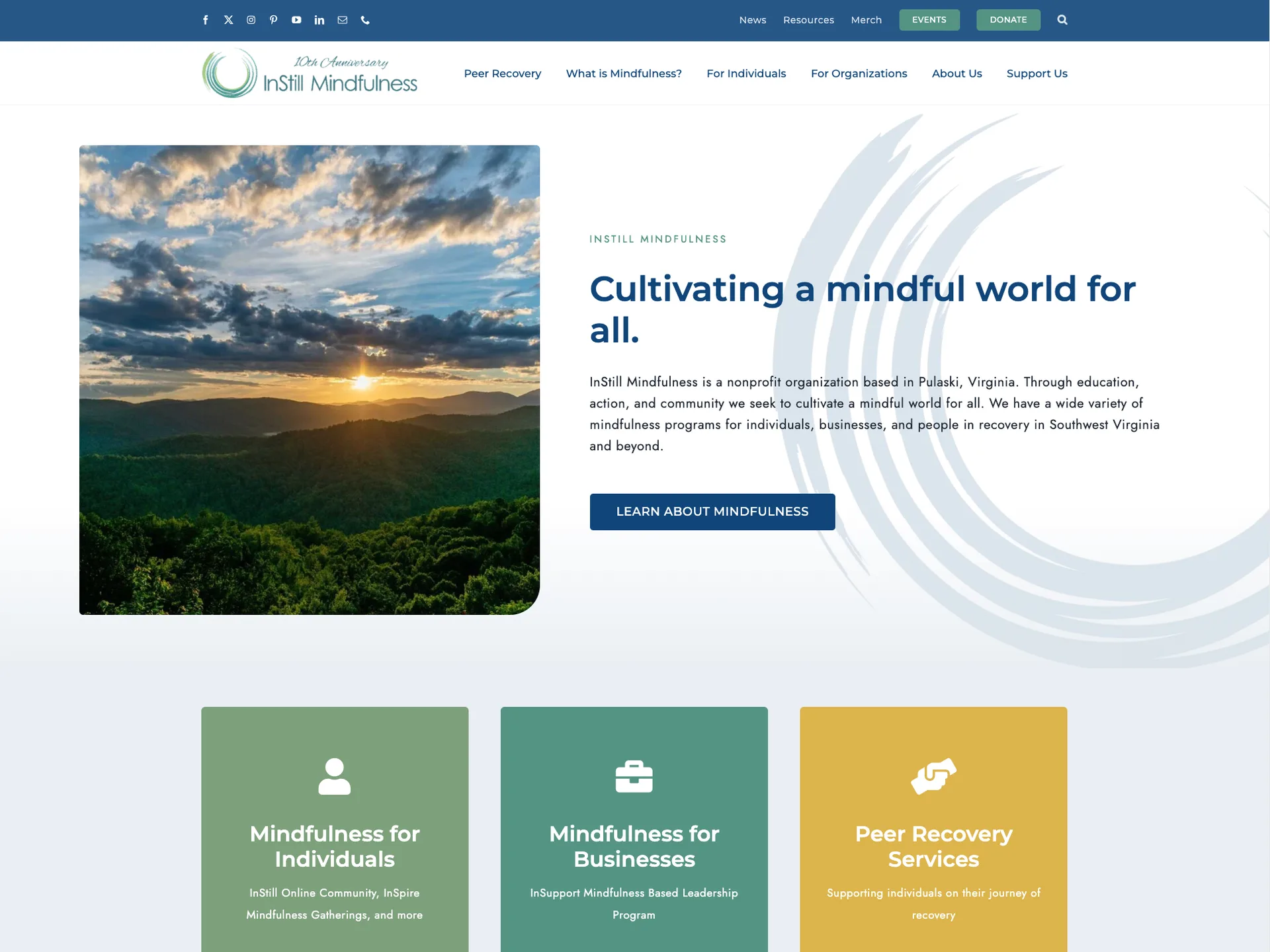 InStill Mindfulness nonprofit homepage: hero with a Blue Ridge sunrise